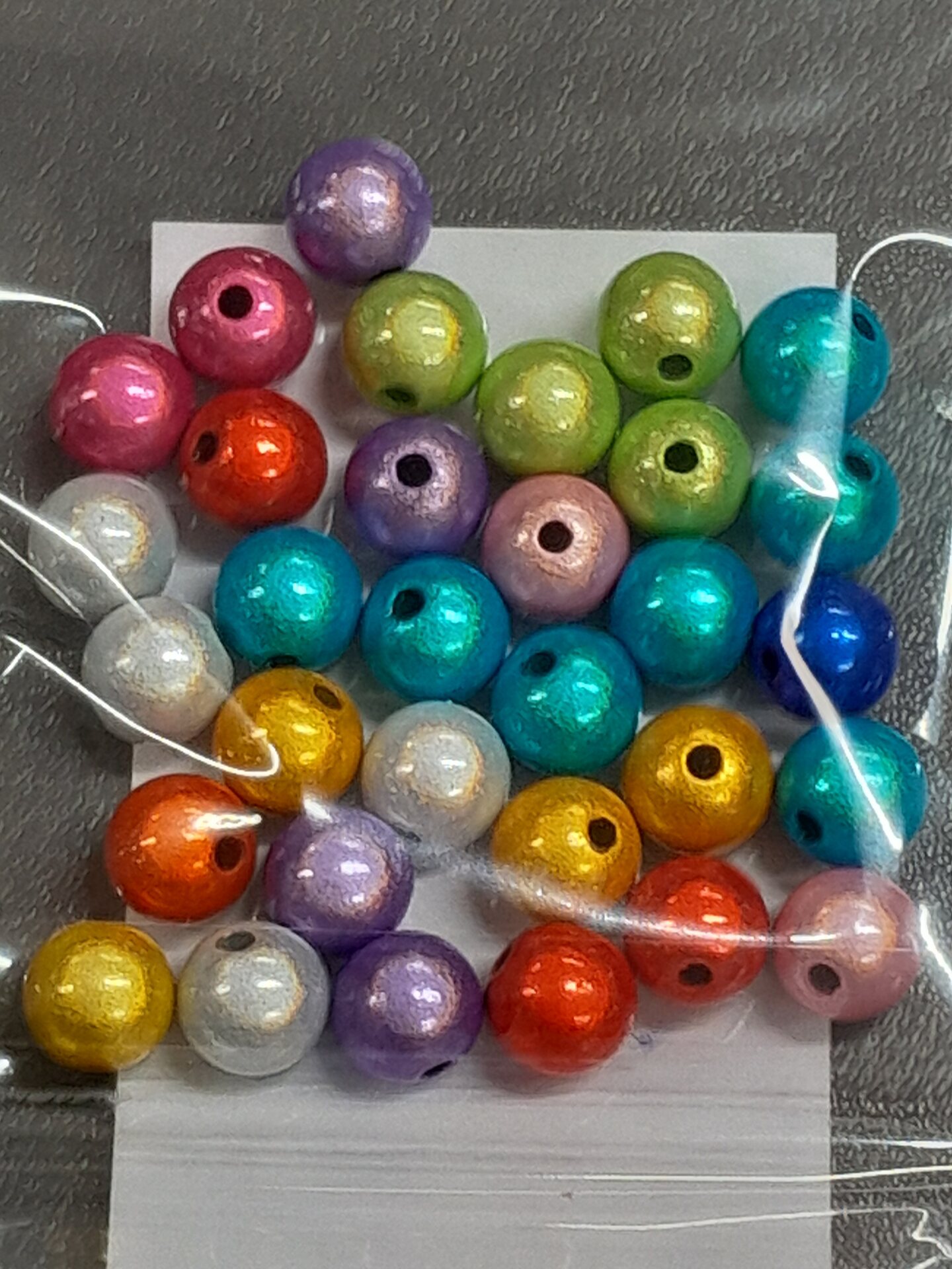 Heijastavia helmiä 8mm n.30kpl Multicolour